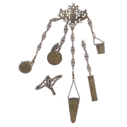 767 - Brass chatelaine with various attachments; together with a white metal chatelaine brooch/clasp (2)... 