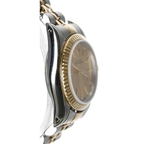 75 - Rolex Oyster Perpetual gold and stainless steel lady's wristwatch, reference no. 67193, serial no. L... 