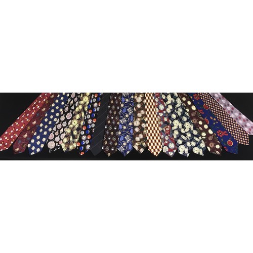 909 - Collection of horology themed gentleman's ties, with a hanging tie rack (18)