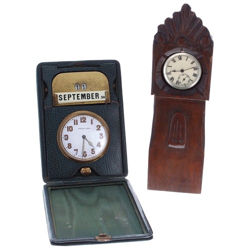 907 - Swiss travel clock and day/date calendar within a green travel case, the clock dial branded 'Finniga... 