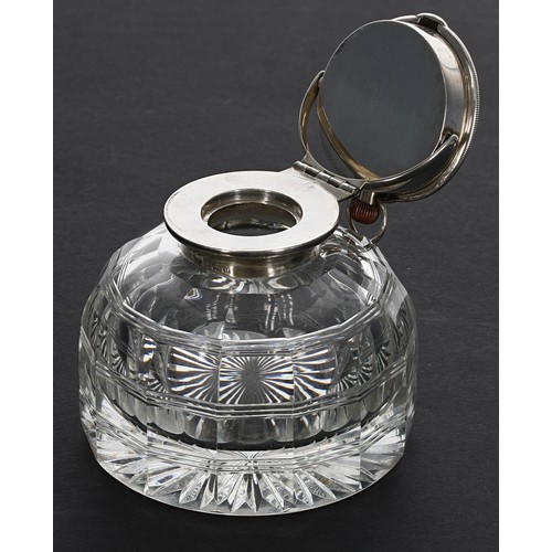 906 - Cut glass desk inkwell with silver swivel cover enclosing a Swiss silver engine turned pocket watch,... 