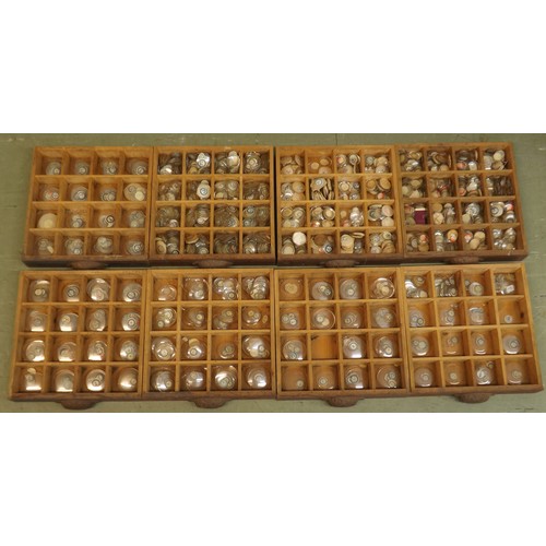 912 - Eight drawer wooden chest containing a large quantity of various sized watch glasses, 16.25'' high x... 