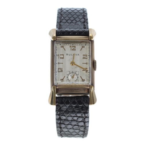 255 - Bulova 10k gold filled rectangular gentleman's wristwatch, circa 1946, silvered dial with gilt Arabi... 