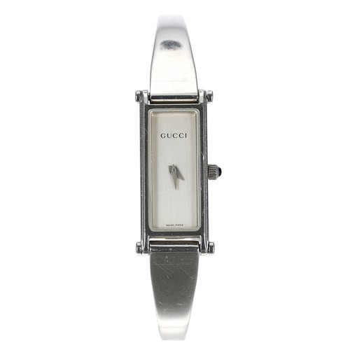 298 - Gucci stainless steel lady's bangle wristwatch, reference no.1500L, serial no. 074xxxx, silvered dia... 