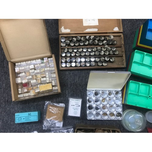 486 - Quantity of watch and clock parts and spares to include wristwatch hands, pocket watch and wristwatc... 