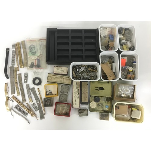 490 - Quantity of assorted watch parts and spares to include washers, wheels, balances, stems, bracelets a... 