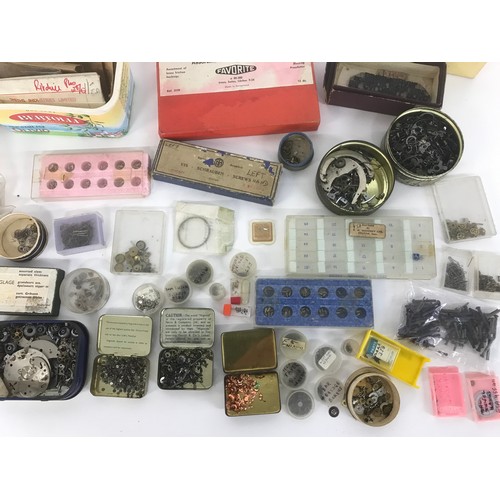 491 - Quantity of assorted watch parts to include clicks, screws, stems etc; together with watch parts bro... 