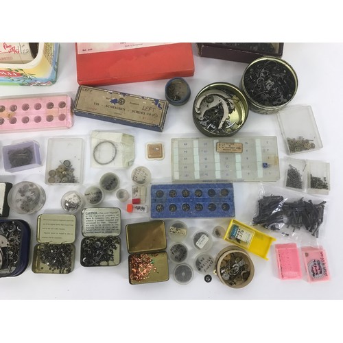 491 - Quantity of assorted watch parts to include clicks, screws, stems etc; together with watch parts bro... 