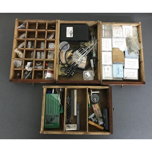 926 - Fourteen drawer wooden chest containing a quantity of assorted watch makers tools and parts/spares t... 