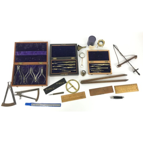 929 - Two cased sets of antique writing/drawing instruments; together with a cased set of plier tools and ... 