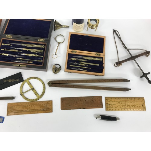 929 - Two cased sets of antique writing/drawing instruments; together with a cased set of plier tools and ... 