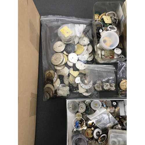 493 - Large quantity of quartz wristwatch movements; together with a quantity of wristwatch dials, wristwa... 