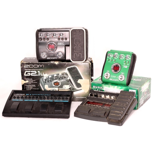 957 - Zoom G2.1U guitar effects pedal, boxed; together with a Zoom GFX707 guitar pedal, a Zoom A2 acoustic... 