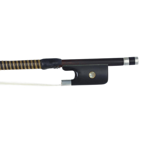 2249 - Nickel mounted violin bow stamped Imperial, the stick round, the ebony frog inlaid with pearl eyes a... 