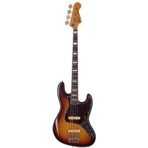 75 - Fender Jazz Bass guitar, made in USA, circa 1973; Body: sunburst finish, small rout under guard abov... 