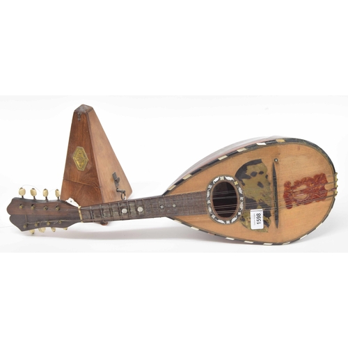 1598 - Old Neapolitan mandolin labelled and by F. de Mureda... Napoli Anno 1899; also an old walnut Maelzel... 