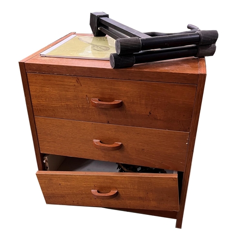 1131 - Wooden three drawer chest containing a selection of guitar spares and accessories to include a Boss ... 