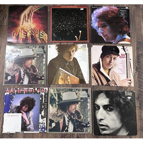 388 - Bob Dylan - nine vinyl record LPs to include Saved, The Band, At Budokan, Hard Rain, Desire, Greates... 