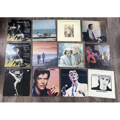 392 - Selection of vinyl records including Simon & Garfunkel, David Bowie, Tom Petty, The Police and B... 