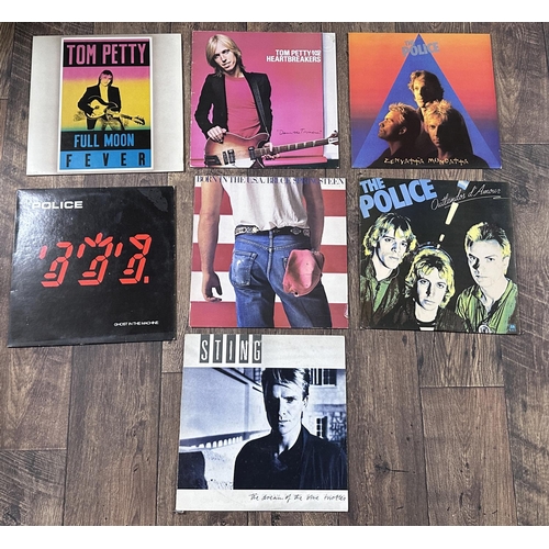 392 - Selection of vinyl records including Simon & Garfunkel, David Bowie, Tom Petty, The Police and B... 