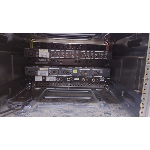 1243 - 6U Rack flight case enclosing six rack units to include a Behringer Striplight, a Behringer multi-ga... 