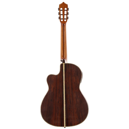 1410 - Santos Martinez SM675CEA electro-acoustic nylon string guitar, with rosewood back and sides and spru... 