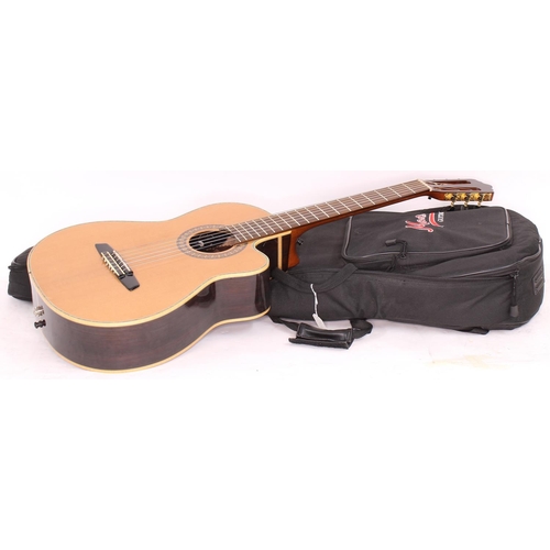 1410 - Santos Martinez SM675CEA electro-acoustic nylon string guitar, with rosewood back and sides and spru... 