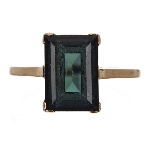 220 - Emerald-cut single stone set gold ring, 2.9gm, width 12mm, ring size K