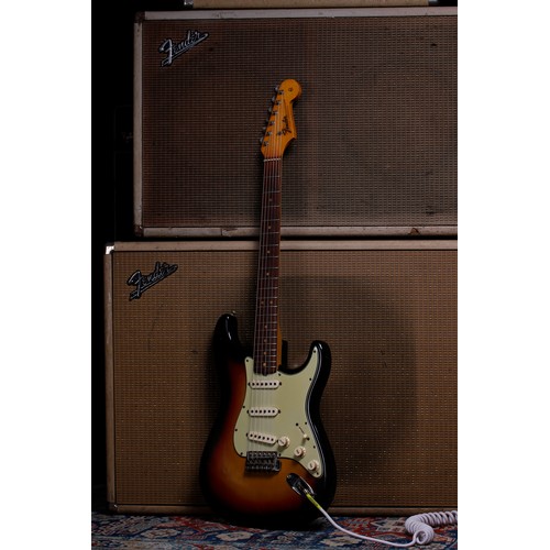 65 - 1965 Fender Stratocaster electric guitar, made in USA; Body: three-tone sunburst finish, light check... 