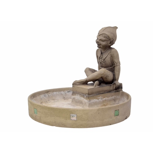 Rare Doulton Lambeth stoneware architectural statue and birdbath  designed by Harry Simeon, modelled as Puck seated on a rectangle plinth with legs crossed, 16" high; upon the separate circular bird bath 24.5" diameter, both pieces with impressed factory stamps and the birdbath with 'reg design no. 735238'