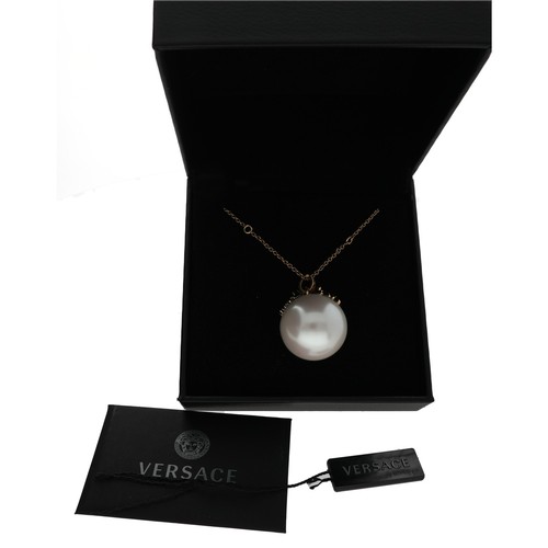 164 - Versace Medusa faux pearl and plated pendant on necklace, with box, tag and booklet