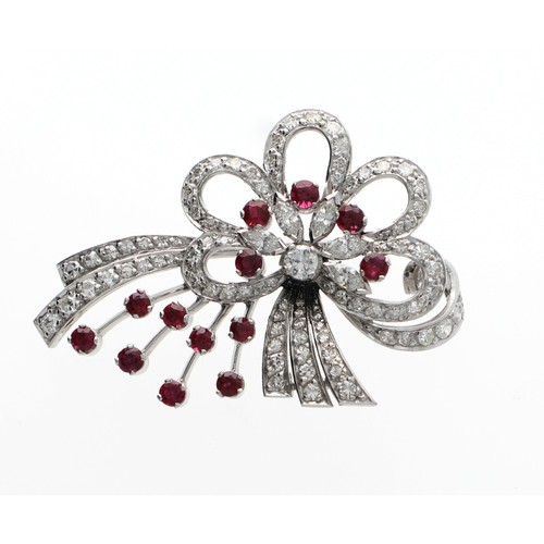 118 - Attractive ruby and diamond white metal bow brooch, with thirteen round-cut rubies, round and marqui... 