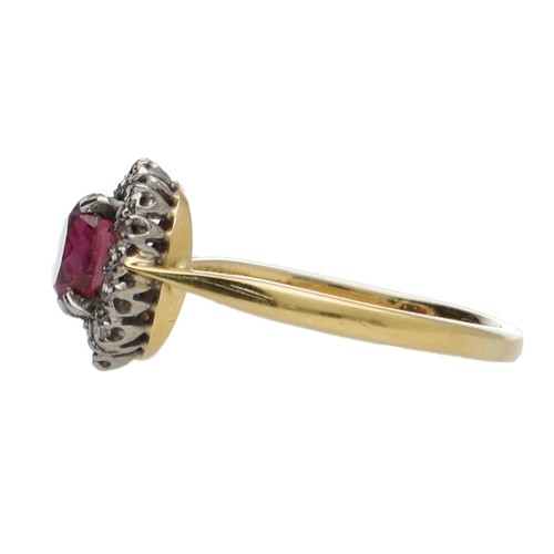 151 - Pretty 18ct yellow gold oval ruby and diamond cluster ring, the ruby 0.65ct approx, 11mm x 9mm, 2.8g... 