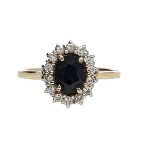 152 - 18ct yellow gold sapphire and diamond oval cluster ring, the sapphire 0.90ct approx, round brilliant... 