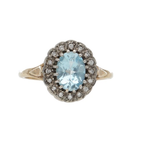 158 - 9ct yellow and white gold cluster ring, set with central oval blue topaz surrounded by halo of round... 