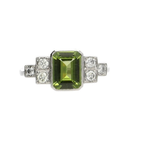 174 - Modern platinum peridot and diamond ring, the peridot 1.25ct approx, round brilliant-cut diamonds, w... 