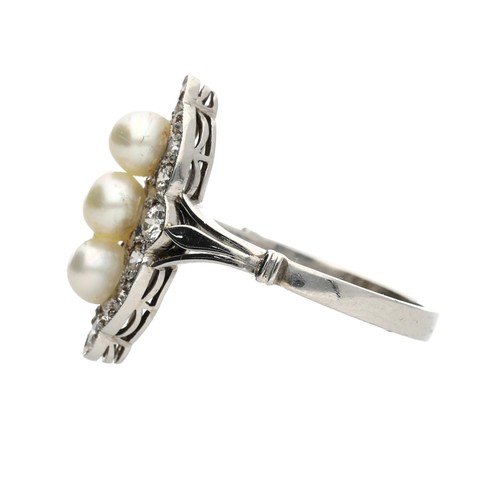 233 - Attractive pearl and diamond white metal marquise shaped dress ring, with three centred cultured pea... 