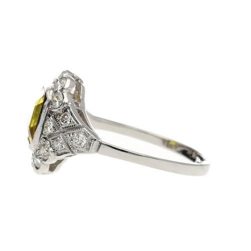 298 - Good platinum yellow sapphire and diamond cluster ring, the sapphire 2.00ct approx, round brilliant-... 