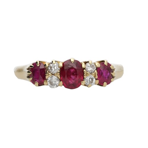 117 - 18ct yellow gold claw set ruby and diamond ring, with three oval rubies 0.90ct approx in total, and ... 