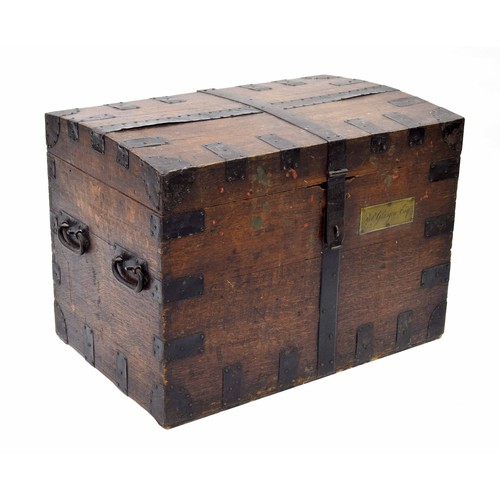 256 - 19th century metal bound oak silver chest, the slightly domed hinged lid with metal strapwork enclos... 