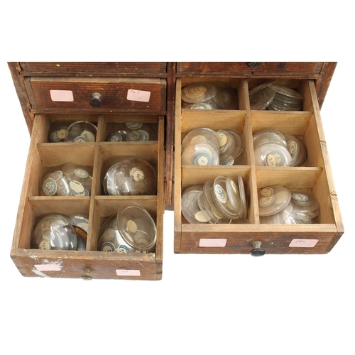 212 - Twelve drawer wooden chest containing a quantity of assorted watch glasses of various sizes, 27.5'' ... 