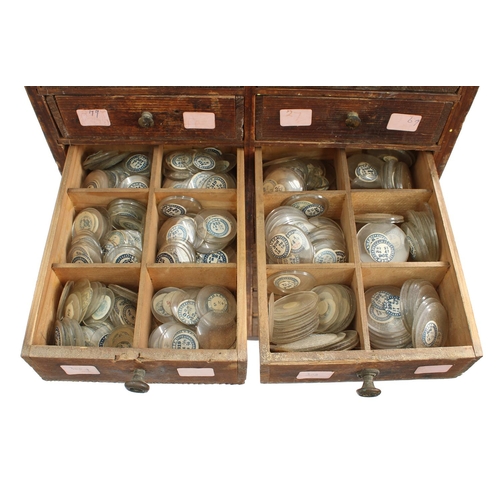 212 - Twelve drawer wooden chest containing a quantity of assorted watch glasses of various sizes, 27.5'' ... 