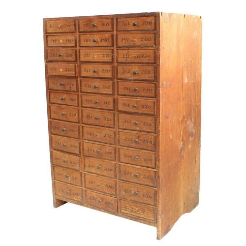 219 - Twelve drawer wooden chest containing a quantity of assorted watch glasses of various sizes, 27.25''... 