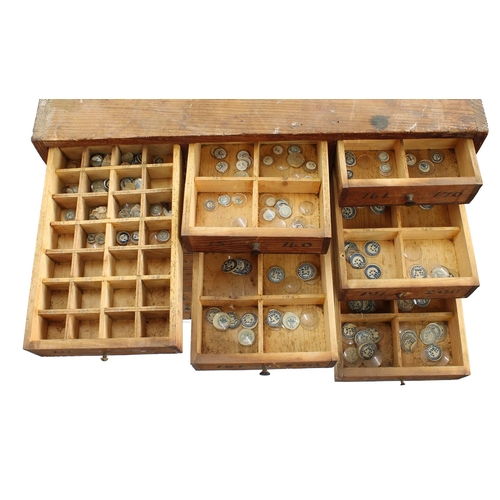 219 - Twelve drawer wooden chest containing a quantity of assorted watch glasses of various sizes, 27.25''... 