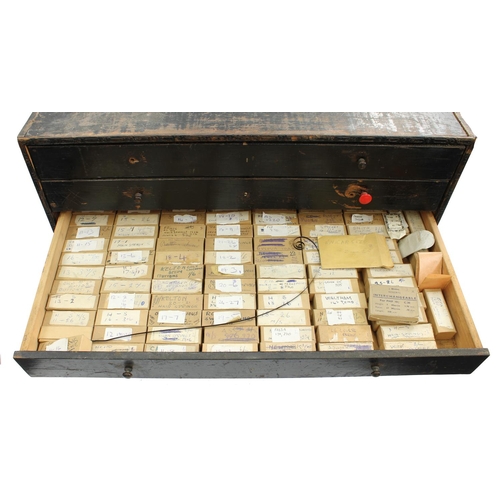 398 - Six drawer wooden chest containing a quantity of watch mainsprings 