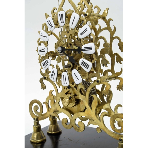 1525 - Brass single fusee skeleton clock with passing strike on a bell, the 6