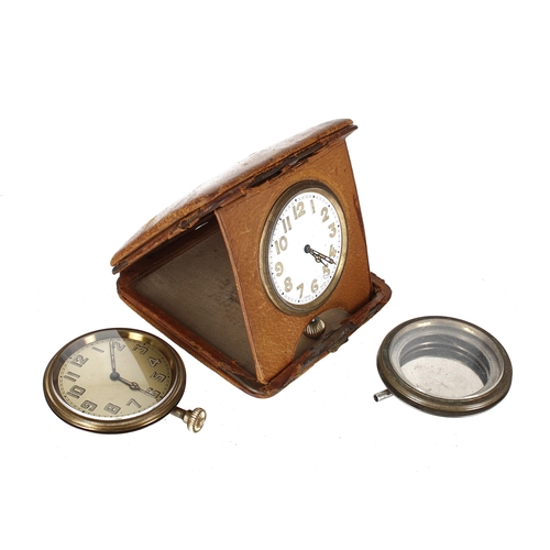 2511 - Two travel clocks, one within a travel case; together with a nickel travel clock case (3)... 