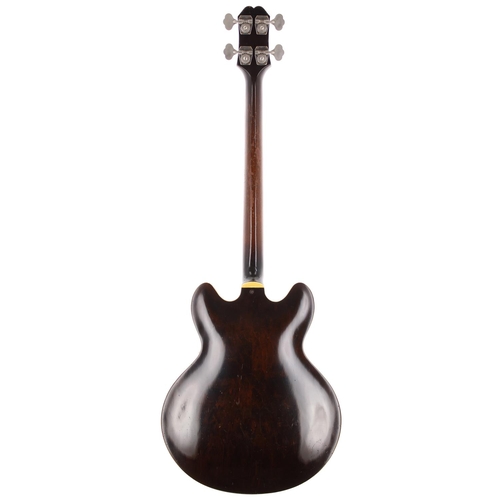 593 - 1964 Epiphone Rivoli semi-hollow body bass guitar, made in USA; Body: sunburst finish top upon brown... 