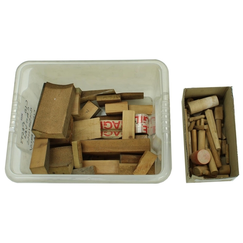 2110 - Tub of assorted jigs: neck cradles, fingerboard sanding/clamping blocks, support wedges and a tub of... 