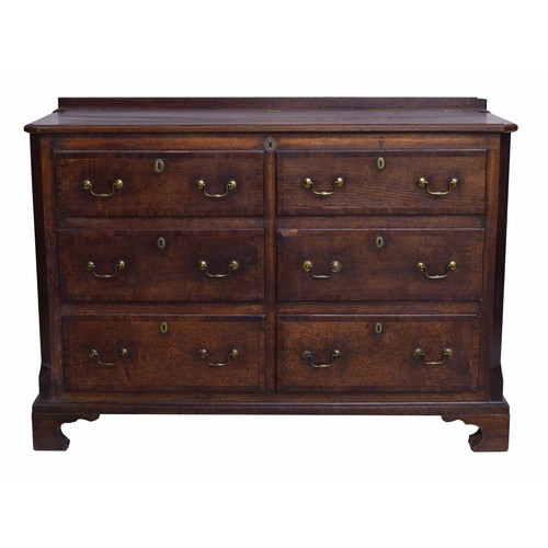 977 - Georgian oak mule chest of drawers, with a hinged lid over two short dummy drawer fronts and four sh... 